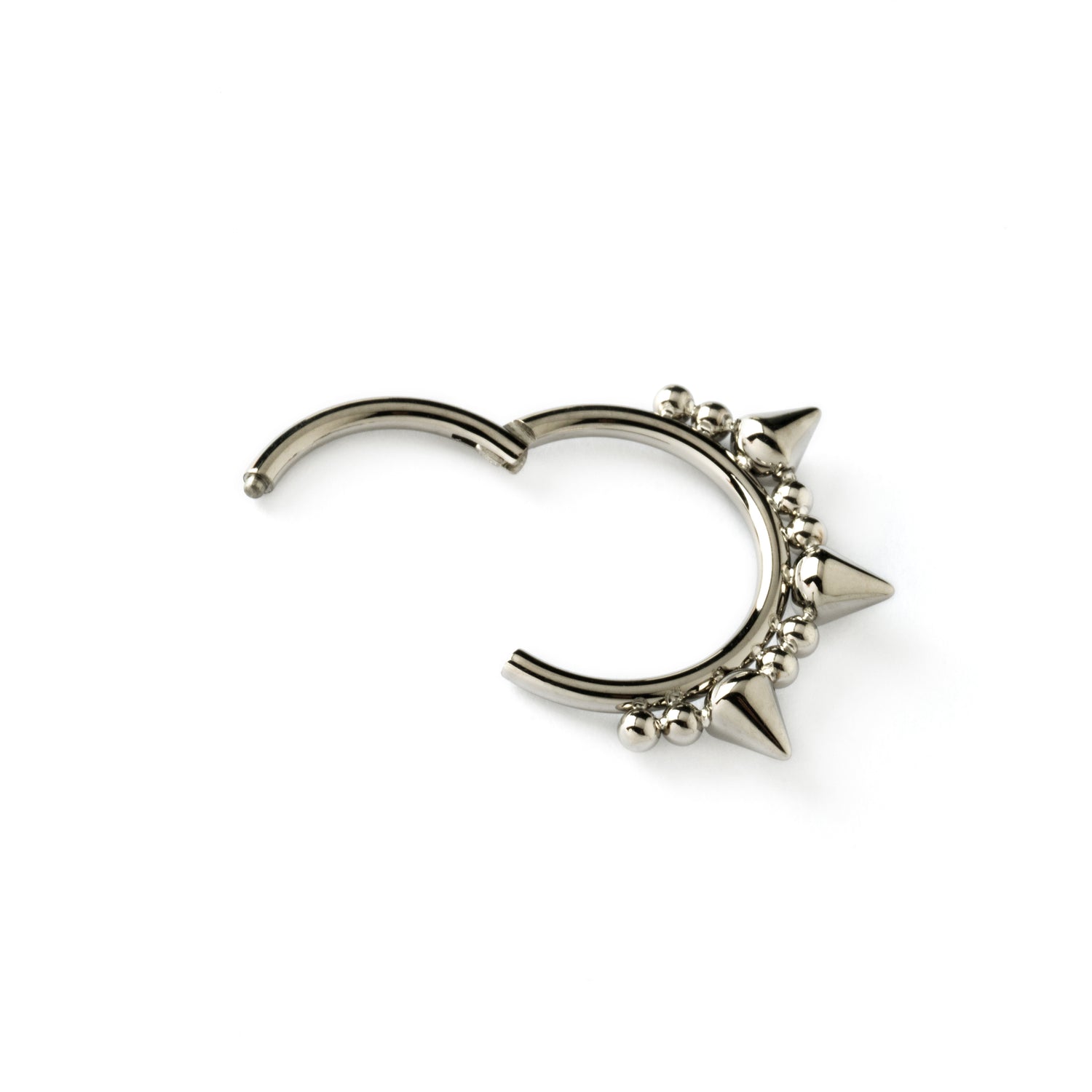 surgical steel clicker ring ornamented with spheres and spikes closure view