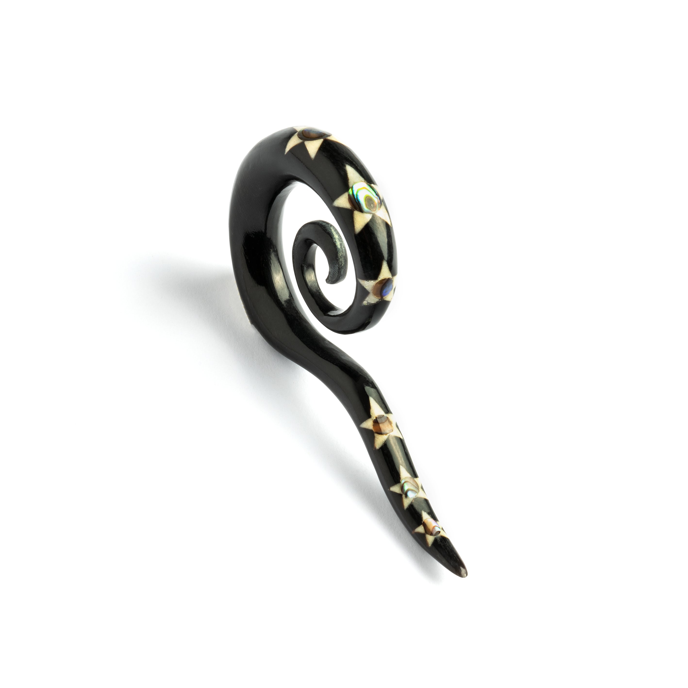 single spiral long hook ear stretcher with pattern of stars and Abalone inlay left side view