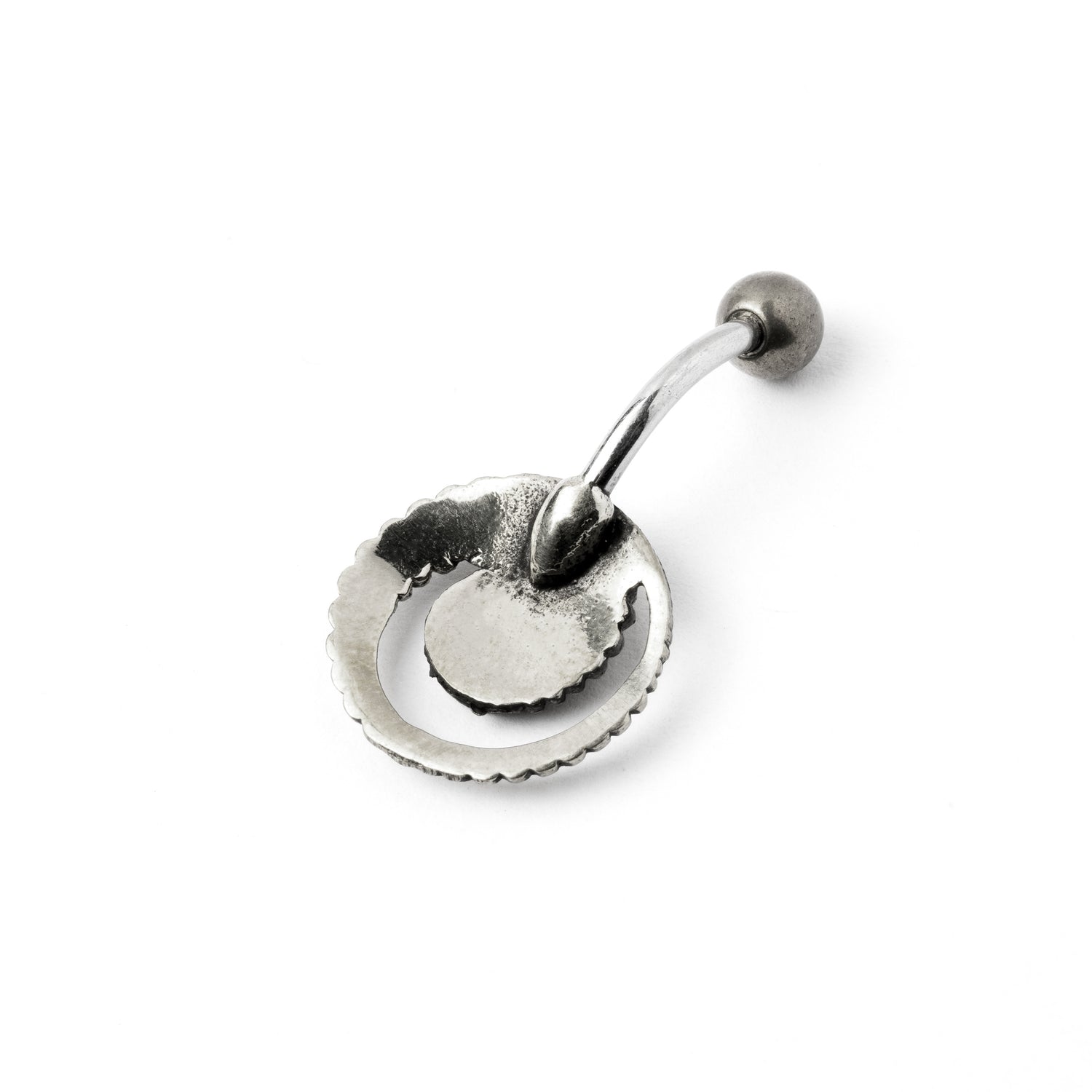 silver spiral belly piercing with mother of pearl shell back side view
