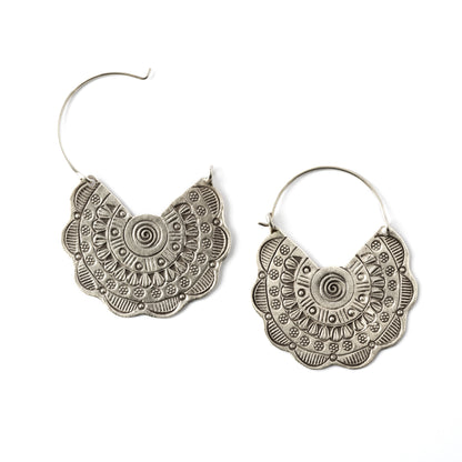 pair of flower disc silver earrings with tribal motifs stamps open modeview