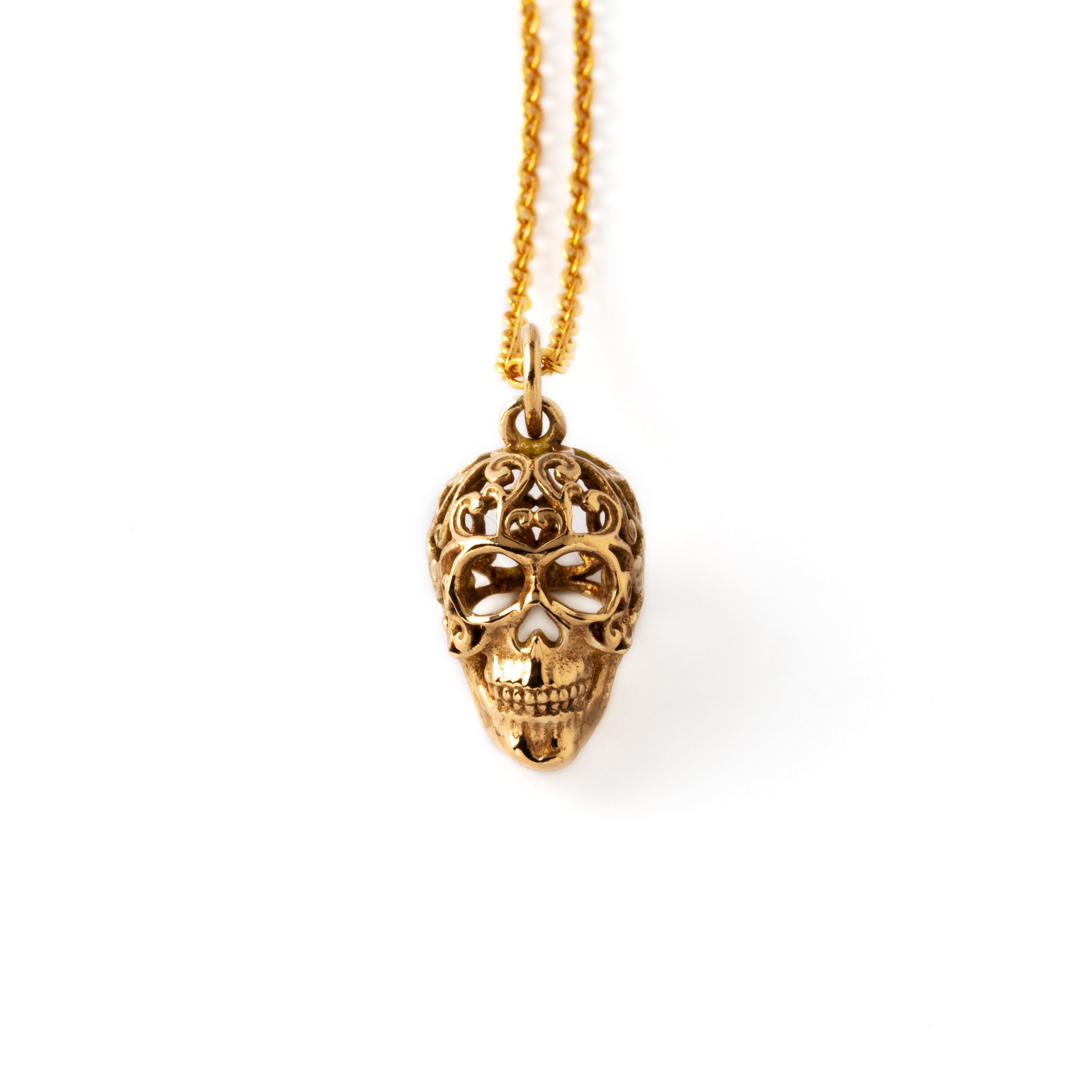 Bronze sugar skull charm on a chain frontal view