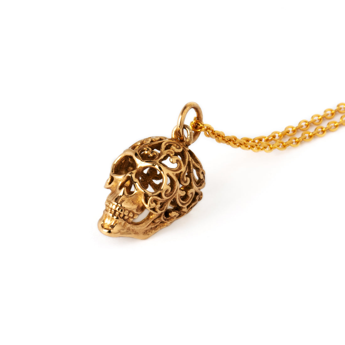 Bronze sugar skull charm on a chain right side front view