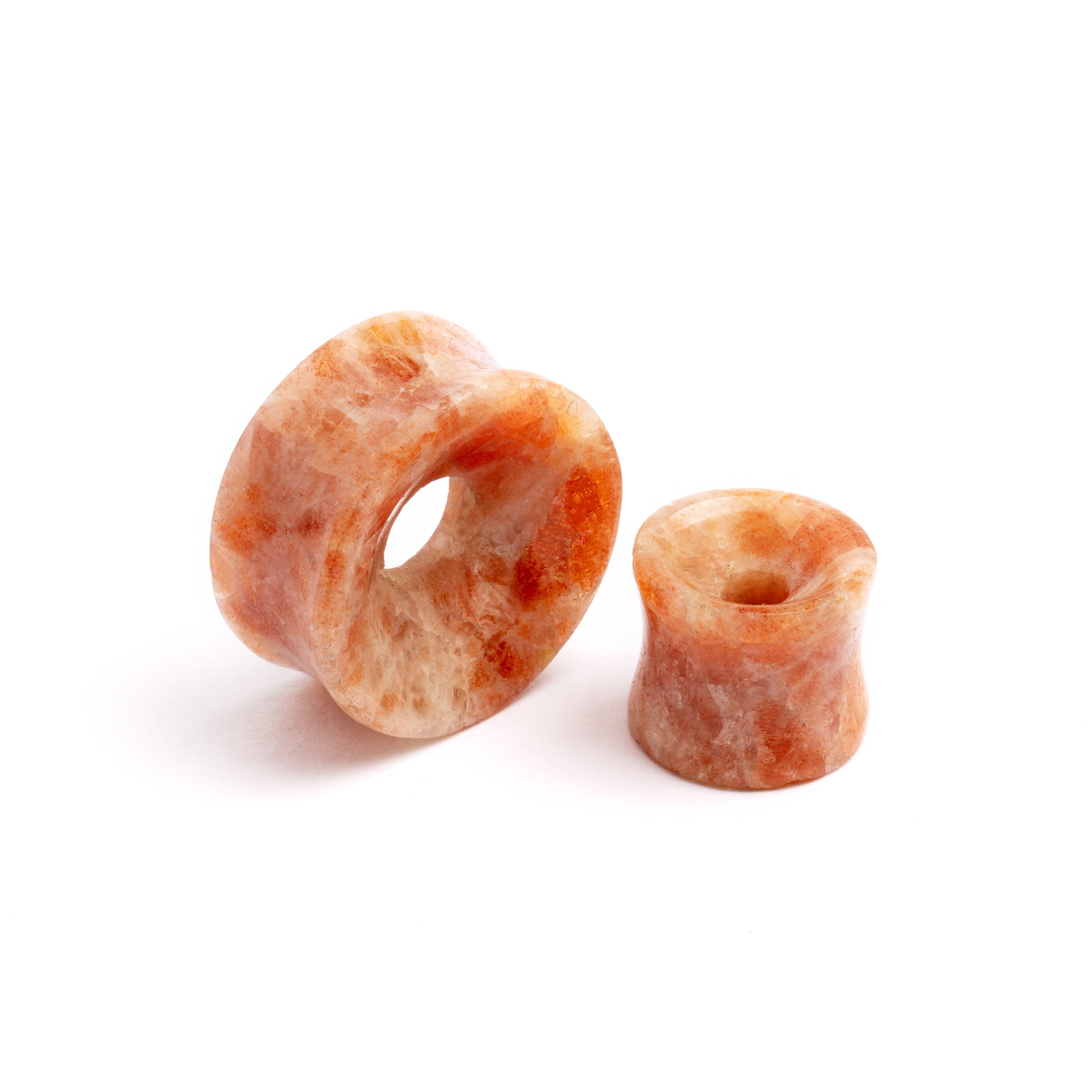 pair of Sunstone double flare stone ear tunnels front and side view