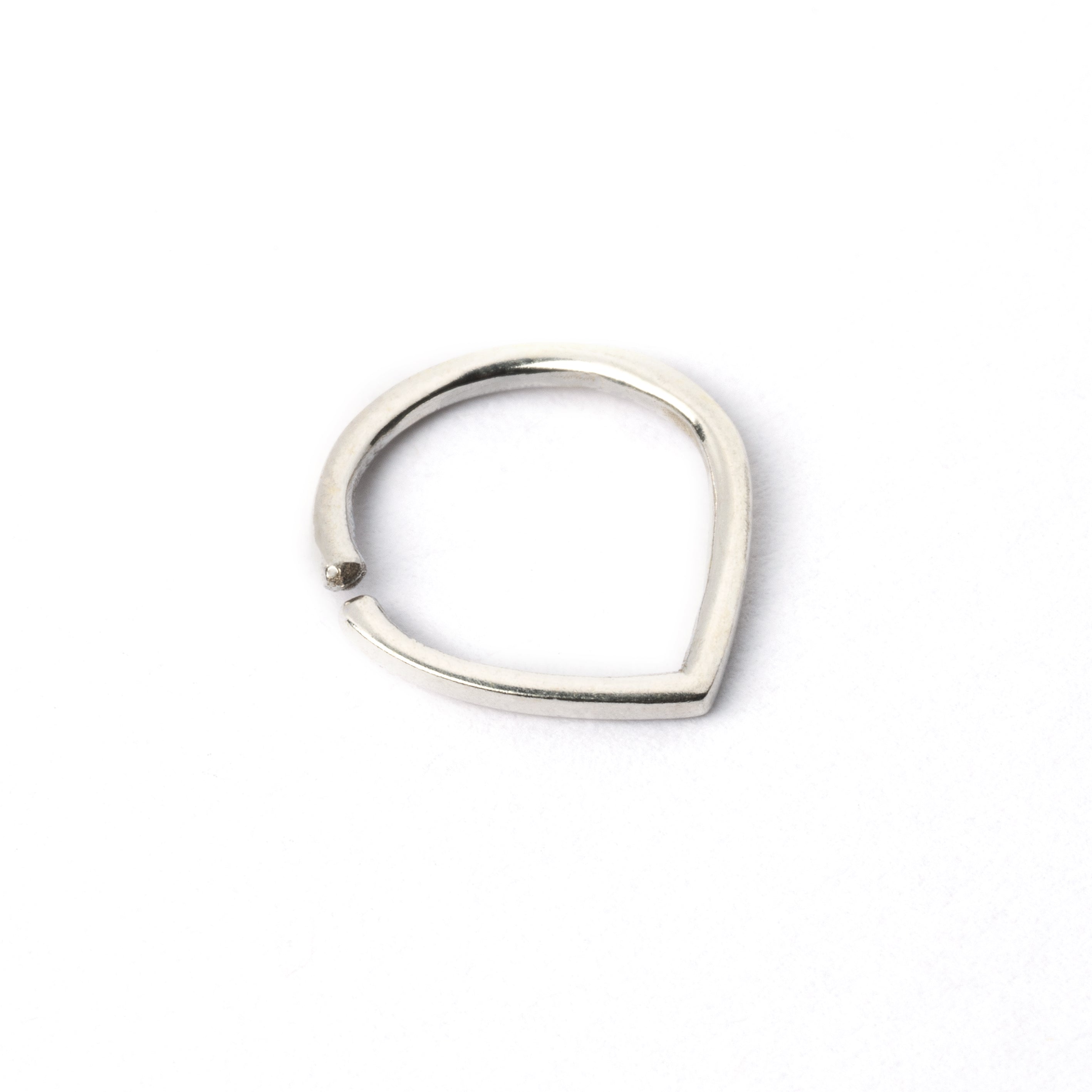 Silver teardrop septum ring left side view