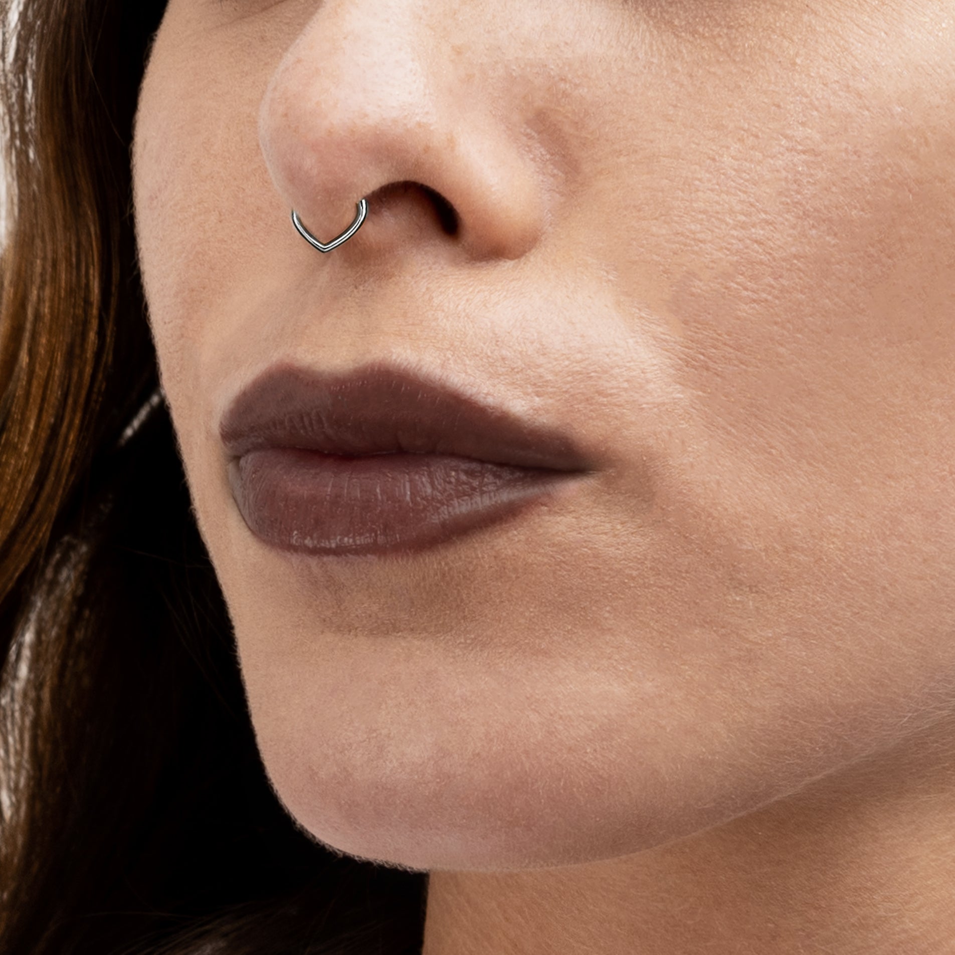 model wearing Teardrop Septum Clicker