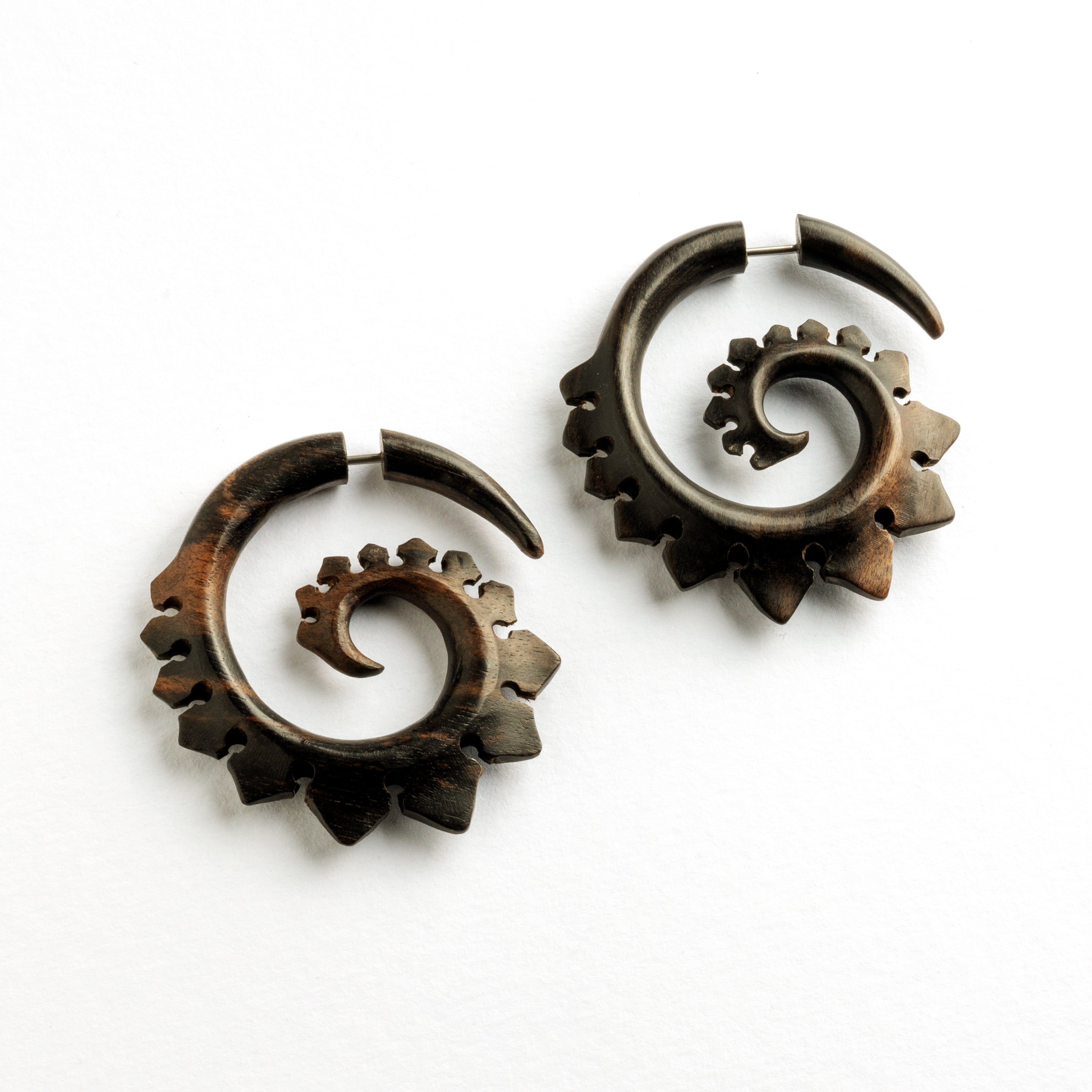 pair of Tipu Blackwood spiral Fake Gauge Earrings side view
