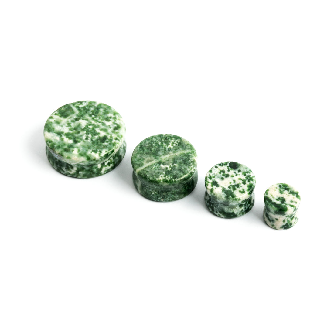 several sizes of double flare Tree Agate sone ear plugs front and side view