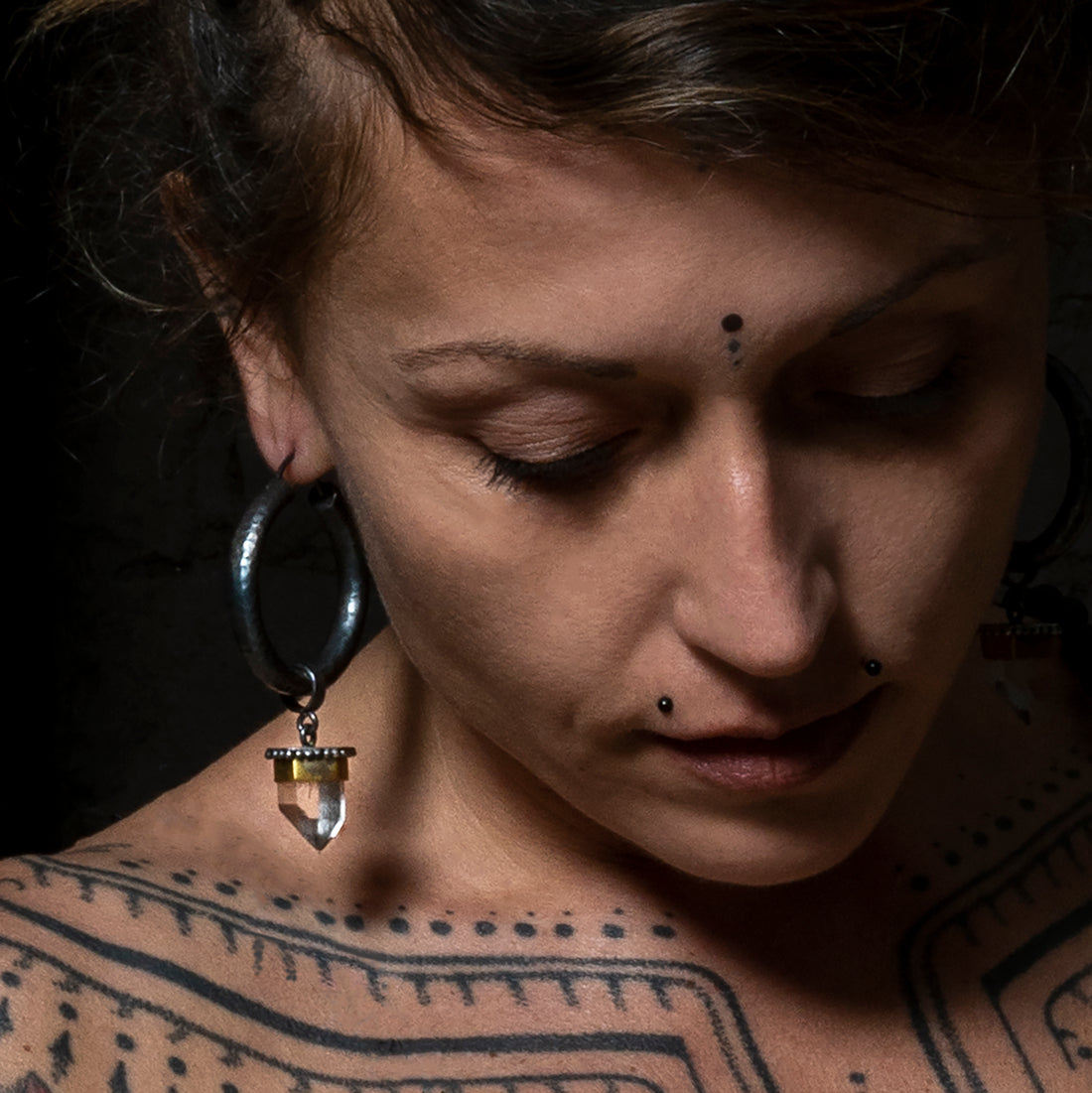 model wearring Shachi Hoops with Crystal Quartz