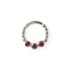 sterling silver dotted septum ring with three Garnet gemstones frontal view