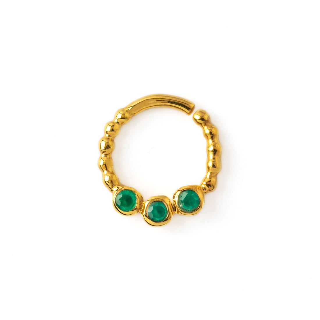 gold dotted septum ring with three Emerald gemstones frontal view