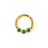 gold dotted septum ring with three Emerald gemstones frontal view