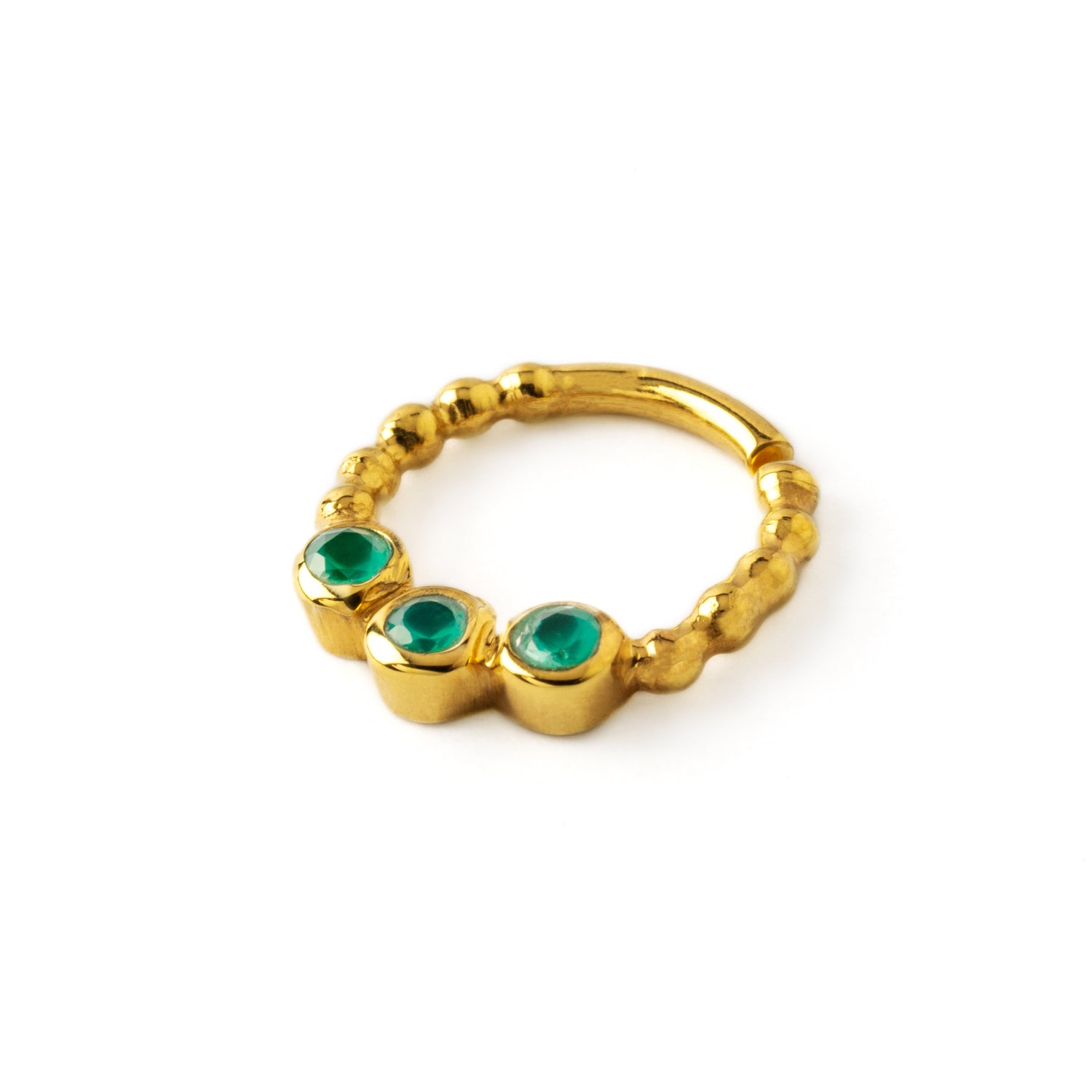 gold dotted septum ring with three Emerald gemstones right side view