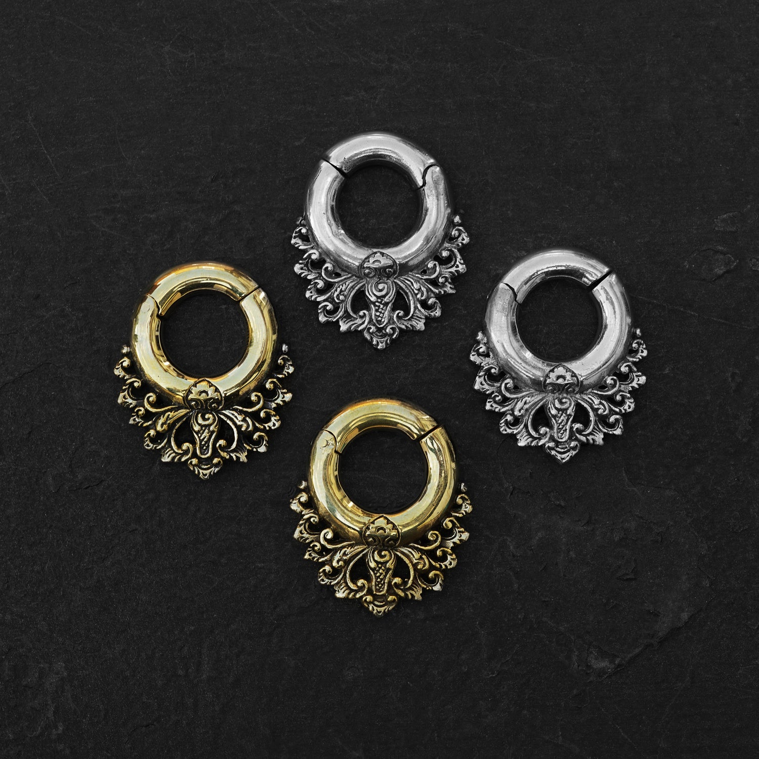 pairs of silver and gold brass ear hangers hoops with floral victorian design frontal view