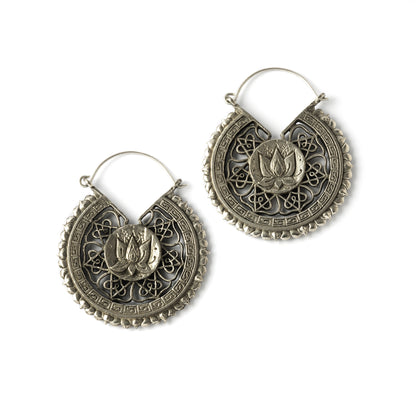 pair of white brass intricate carved lotus round earrings frontal view