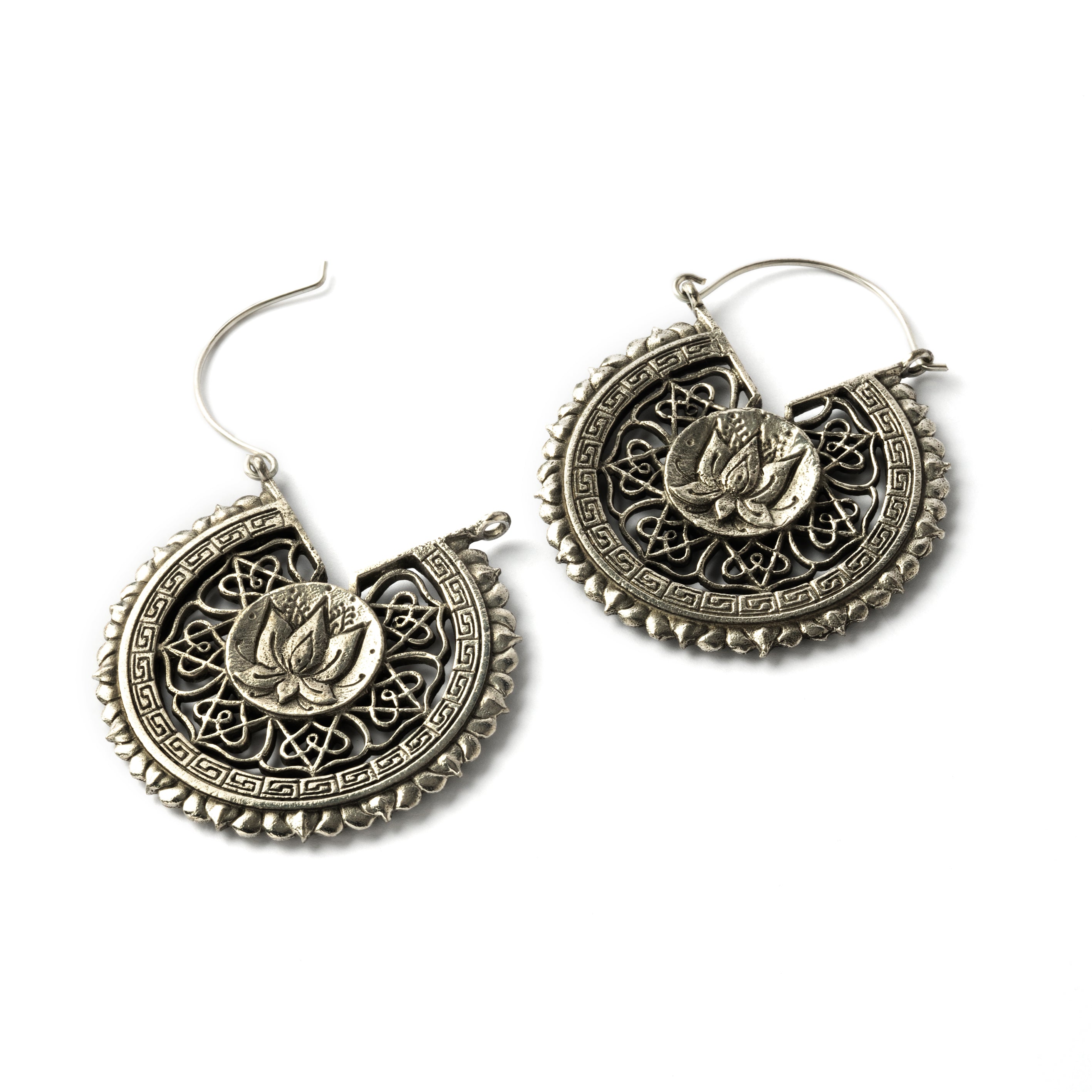 pair of white brass intricate carved lotus round earrings closure view