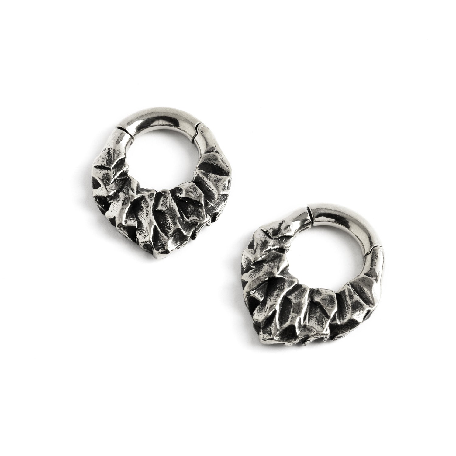pair of silver brass teardrop shaped ear hoops hangers with rocky texture