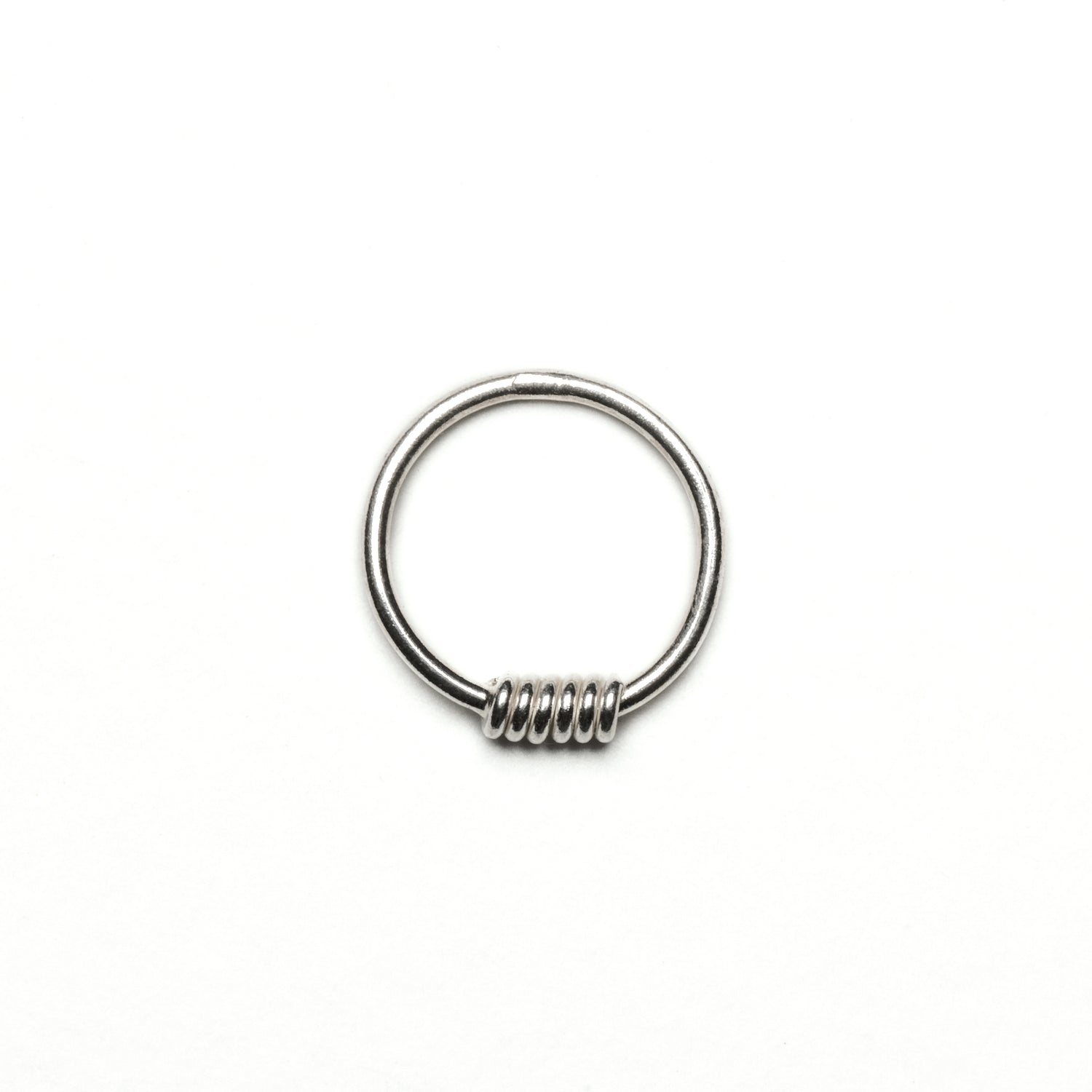 wired silver nose ring frontal view