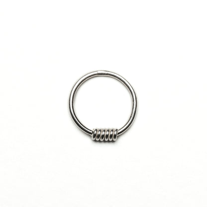 wired silver nose ring frontal view