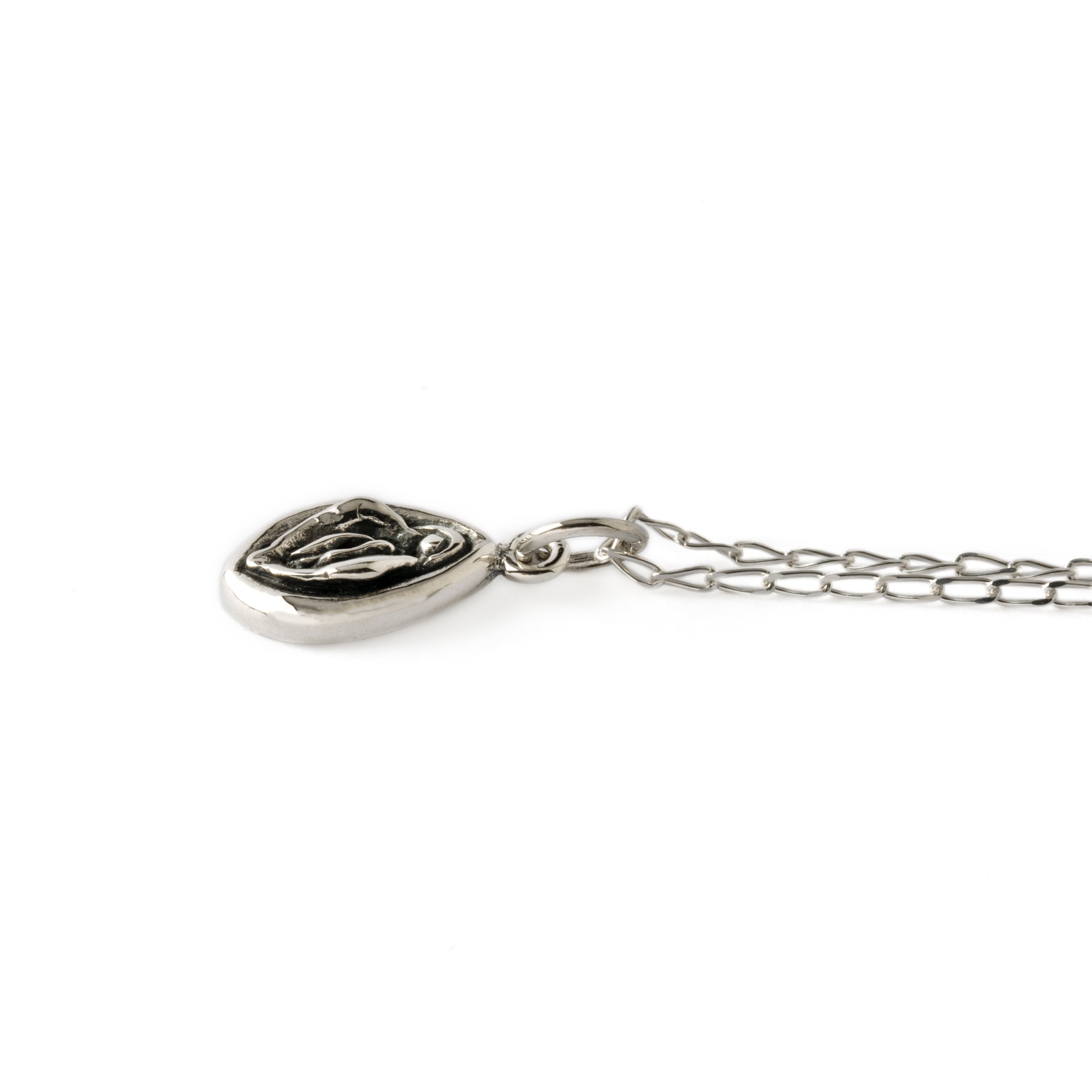 silver Yoni charm necklace side view