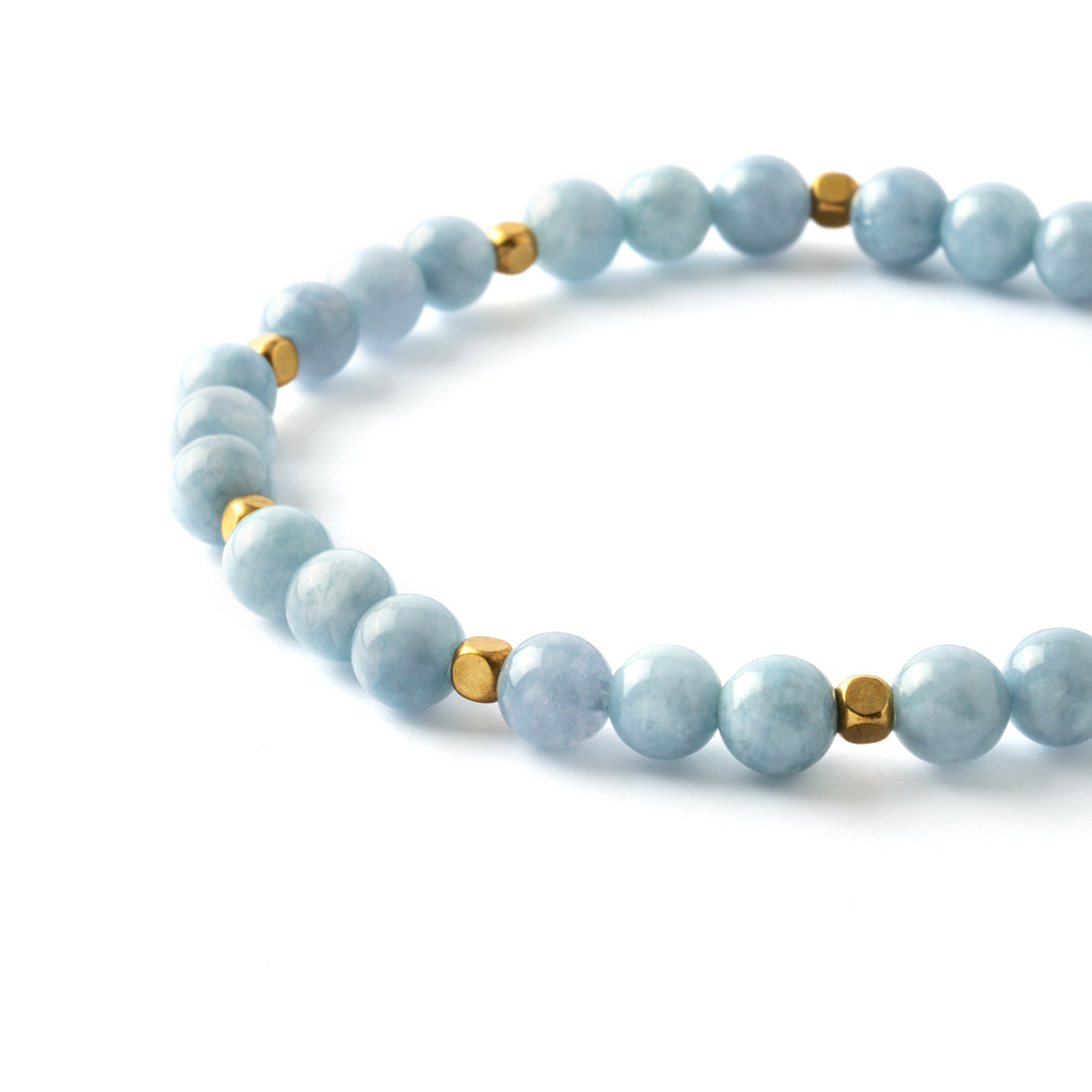 Aquamarine beads bracelet with interlocking petite squared golden brass beads close up view