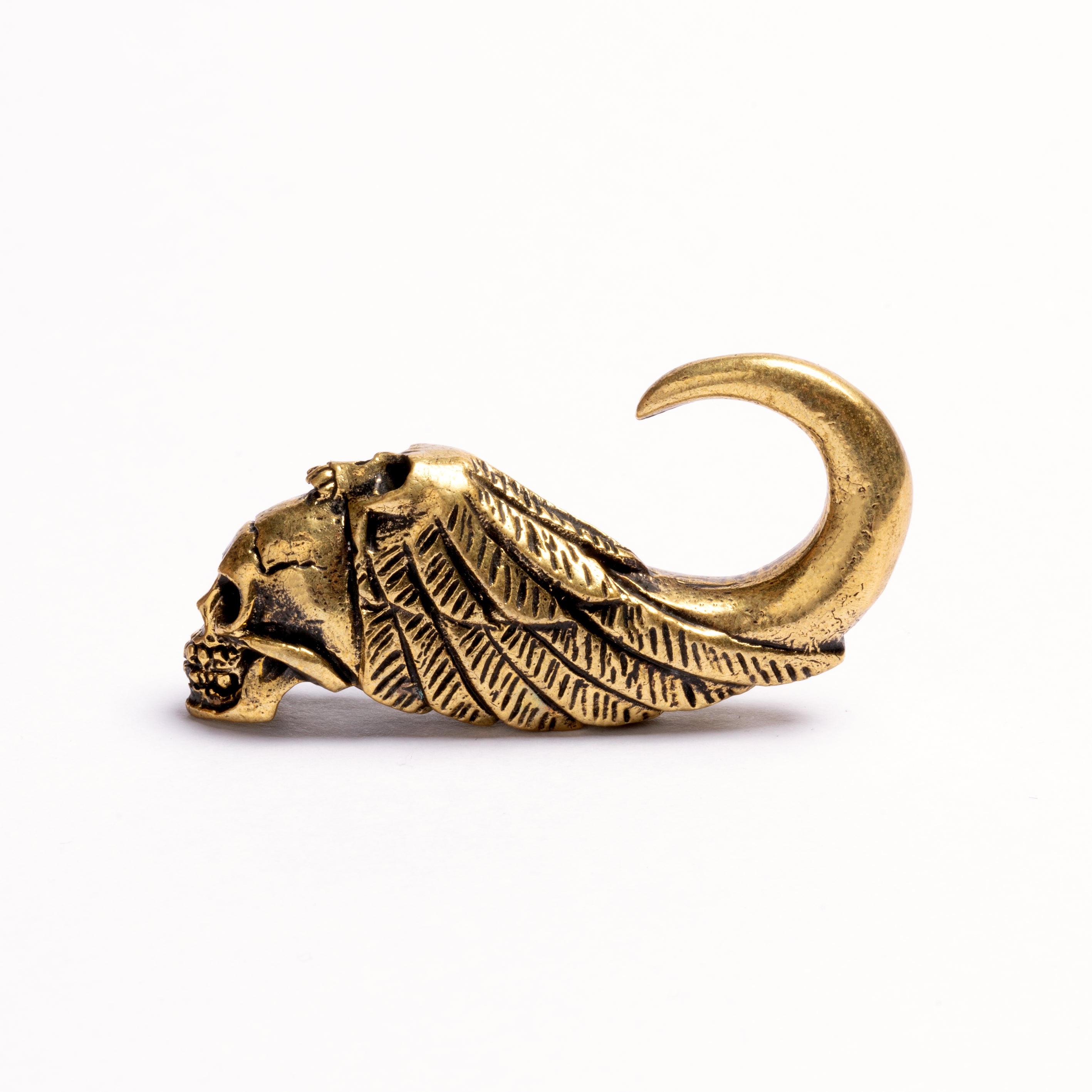 Brass Skull Ear Weight right side view