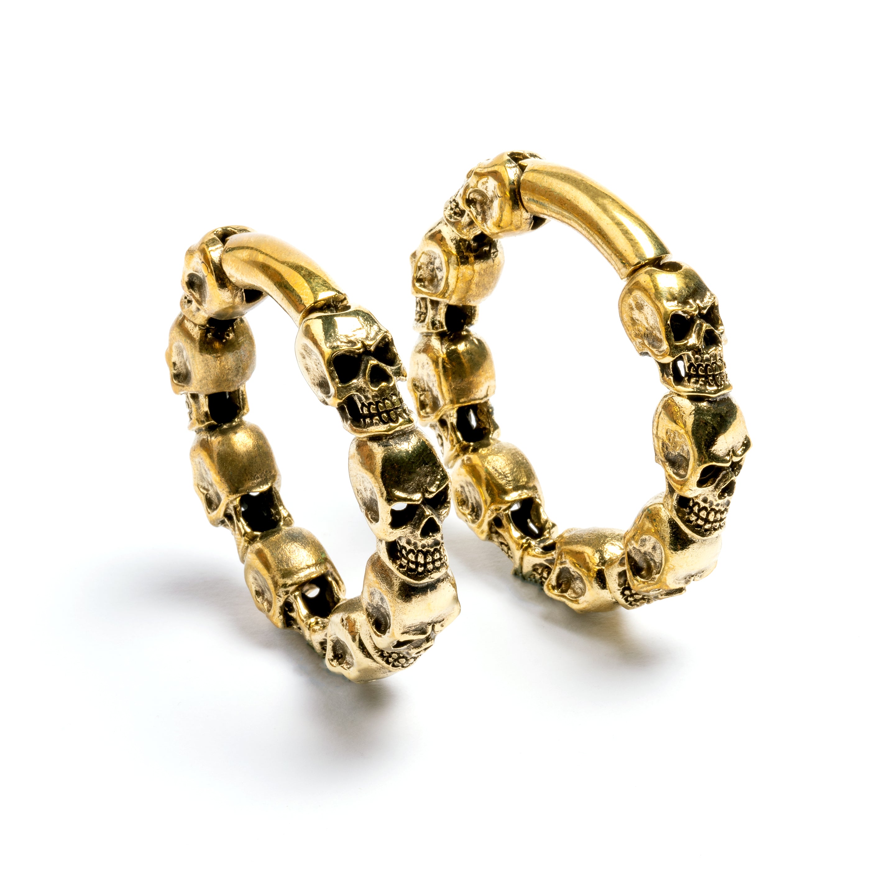 pair of gold brass skulls band hoop gauges frontal view