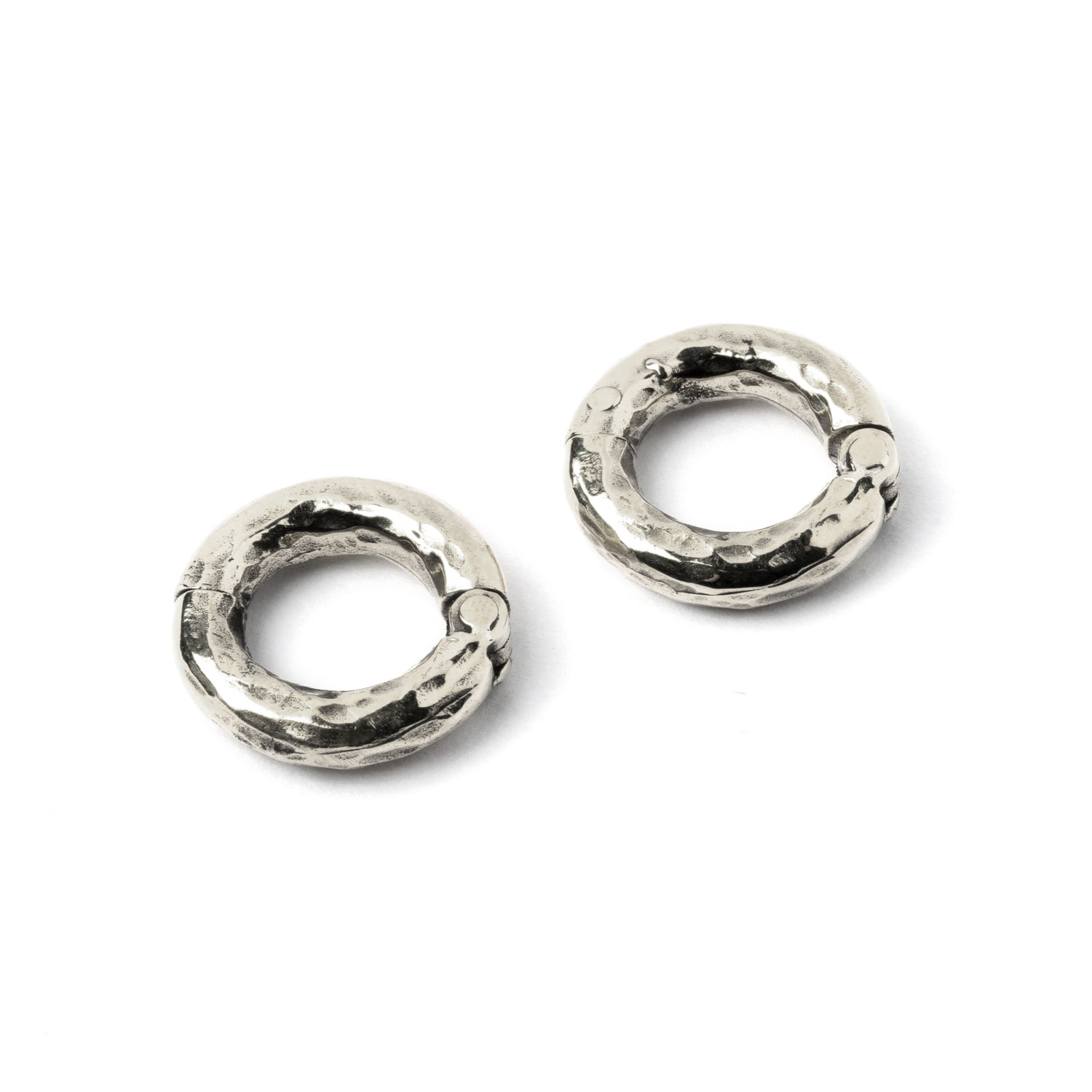 pair of silver hammered gauge hoops front side view