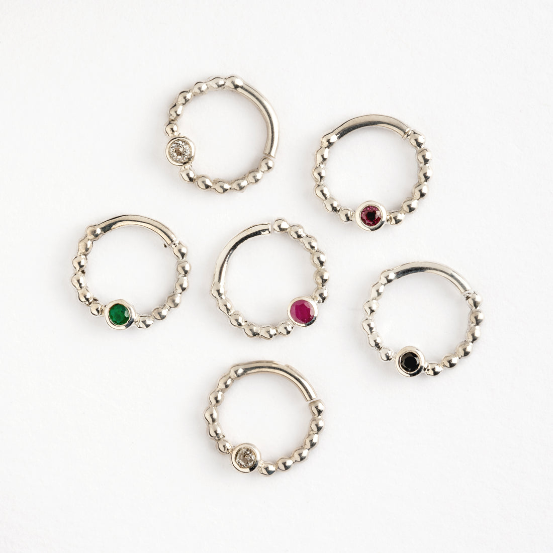 different gemstones sterling silver dotted septum rings frontal view