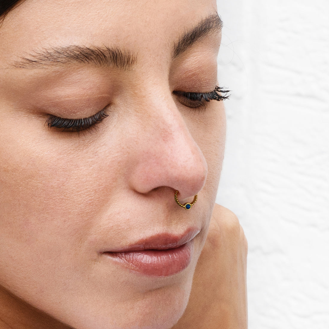 model wearing dayaa septum ring