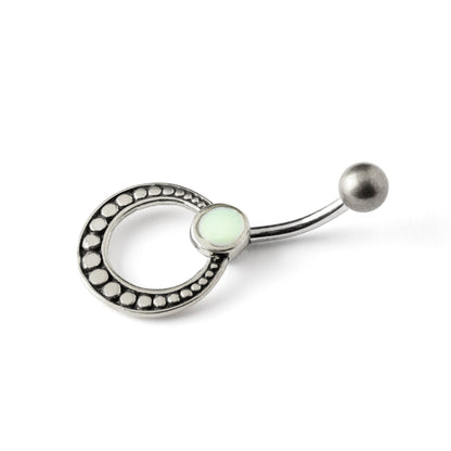 silver circle belly piercing with mother of pearl shell side view