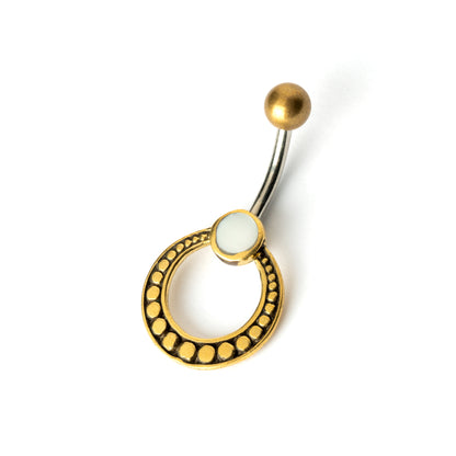 golden brass circle belly piercing with mother of pearl shell right side view