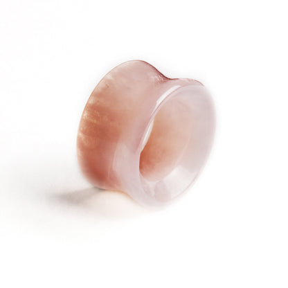 rose quartz double flare stone ear tunnels side view