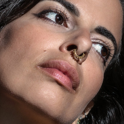 model wearing Sarika Golden Septum Clicker