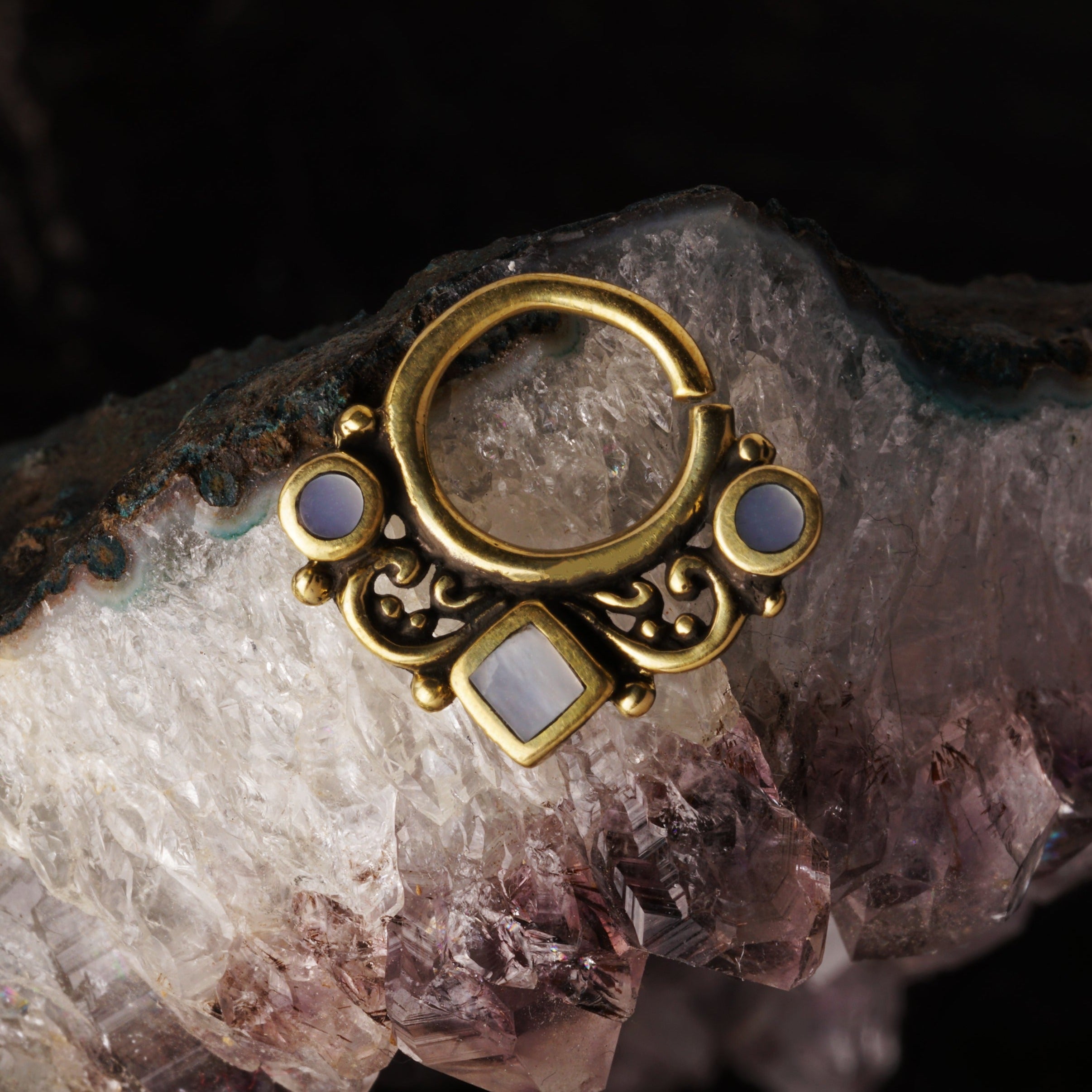 golden brass gothic septum ring with mother of pearl frontal view