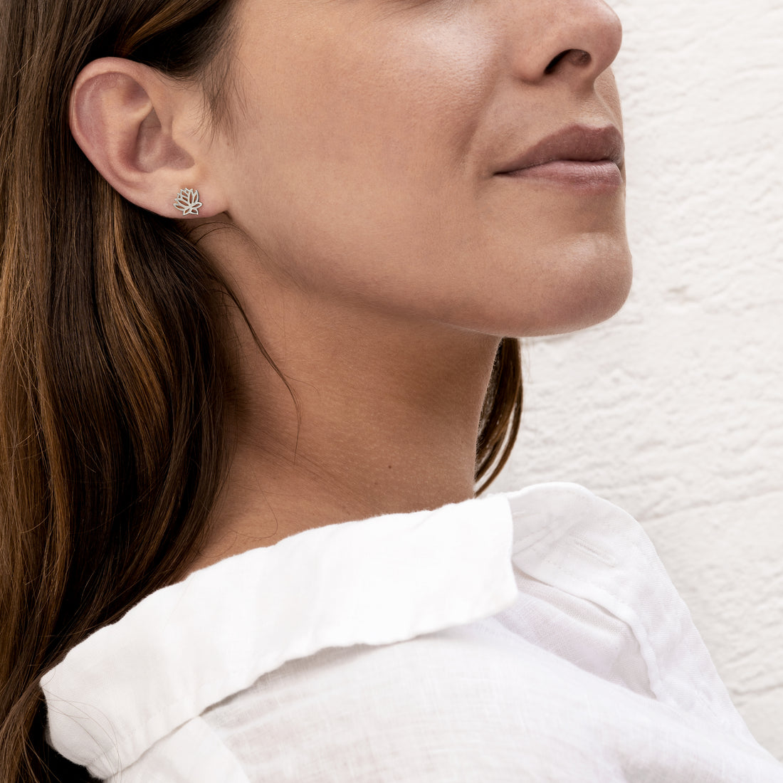 model wearing Silver Lotus contour stud earrings
