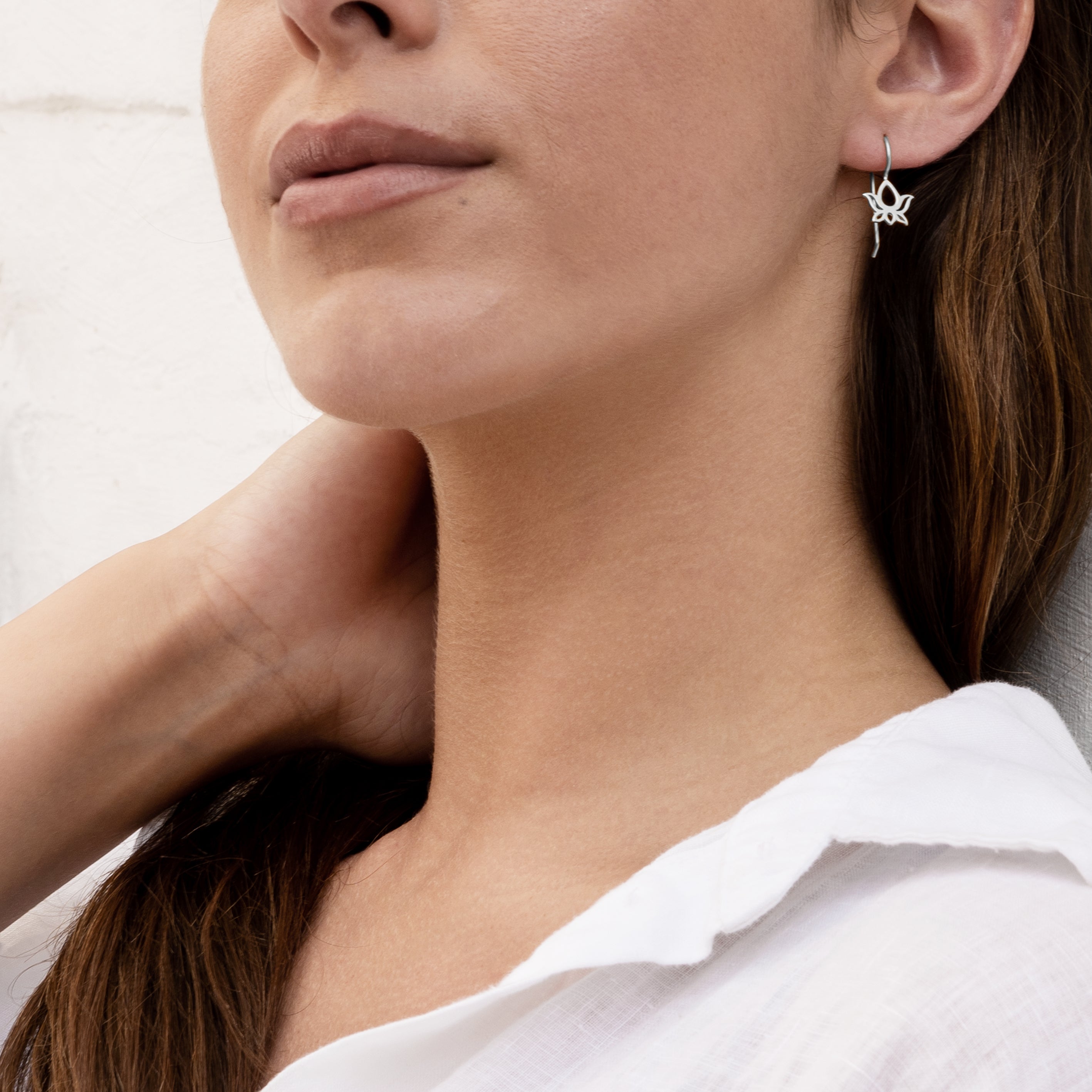 model wearing Silver Lotus Earrings