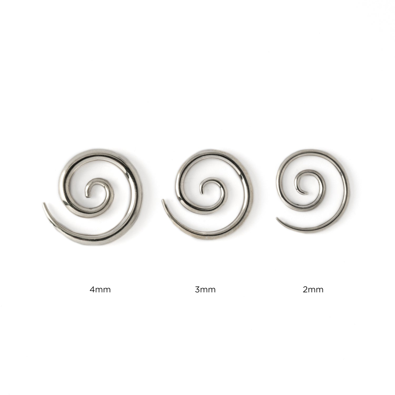 2mm, 3mm, 4mm silver spiral gauge earrings side view