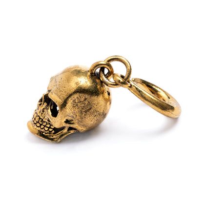 single gold brass skull hook ear weight hanger right side view